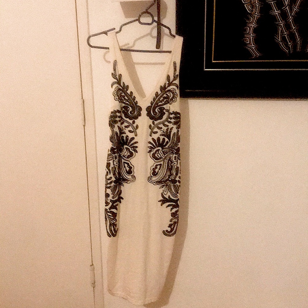 Long black ans white Bebe dress .